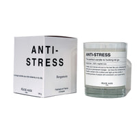 scented candle with the writing "anti-stress" and funny description